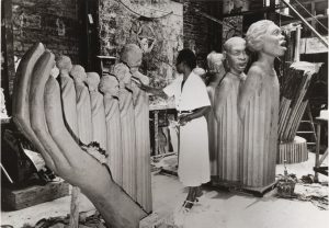 Augusta Savage at work on her famous sculpture, The Harp, commissioned by the 1939 World’s Fair in New York City. New York Public Library Digital Collections